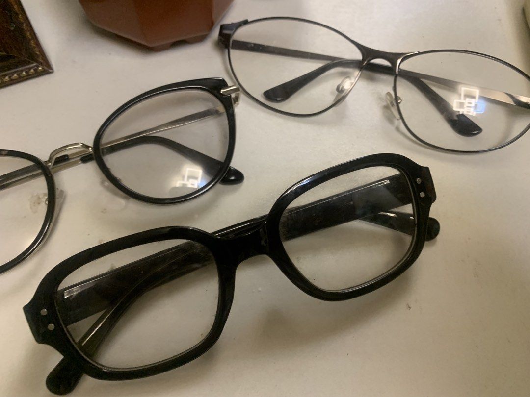 Take all Assorted Eyeglasses Frames Lot of Three (Category: Sunglasses & Eyewear) located in Manila. Submitted by leigh_dior (Listing ID 1466695729, Image 3). Description: - Bundle set of 3 stylish glasses frames - Includes: thick black rectangular, round black & silver, and thin metal oval - Current lenses included (great for replacements) - Ideal for turning into custom prescription specs - Selling all three together.