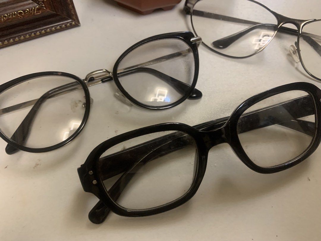 Take all Assorted Eyeglasses Frames Lot of Three (Category: Sunglasses & Eyewear) located in Manila. Submitted by leigh_dior (Listing ID 1466695729, Image 2). Description: - Bundle set of 3 stylish glasses frames - Includes: thick black rectangular, round black & silver, and thin metal oval - Current lenses included (great for replacements) - Ideal for turning into custom prescription specs - Selling all three together.