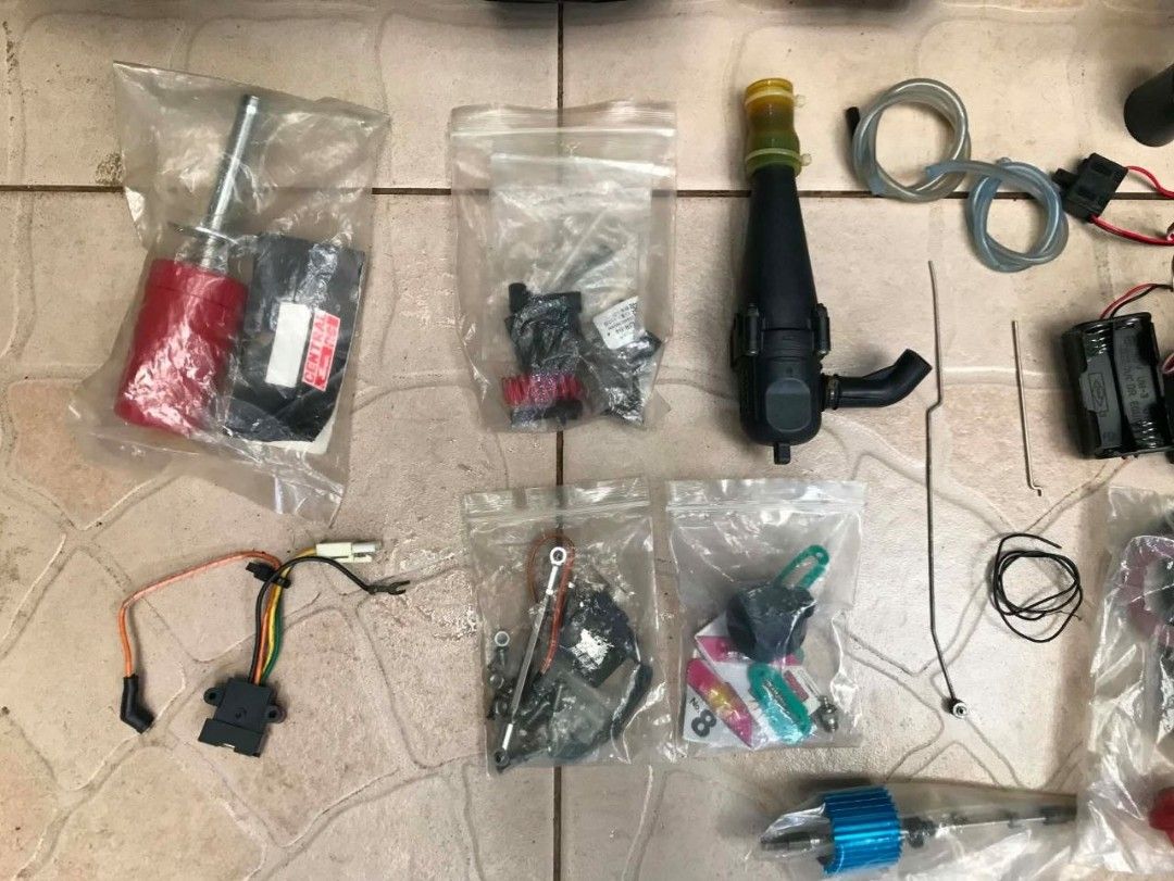 Tamiya Terra Crusher Nitro RC Monster Truck Bundle (Category: Remote Control Toys) located in Manila. Submitted by joelssalum87443 (Listing ID 1466693258, Image 3). Description: Manufactured starting in July 2002, the Tamiya Terra Crusher (TGM-02 chassis) is a flagship 1/8 scale nitro monster truck built with a blue-anodized aluminum alloy lower chassis, high-impact molded composite plastics, and heavy-duty steel drive shafts. Offered as a high-v