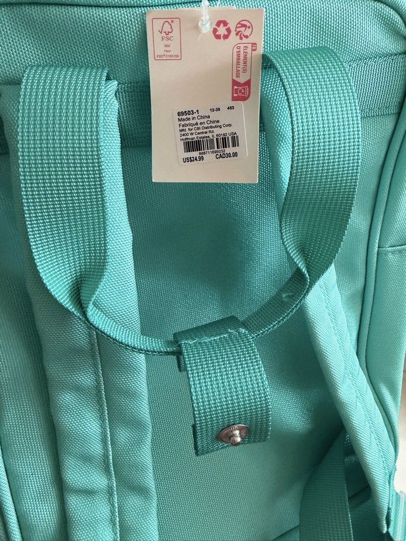Teal Backpack with Heart Motif (Category: Babies & Kids Fashion) located in Quezon City. Submitted by bubspreloved (Listing ID 1466771077, Image 1). Description: - used once (Original US $24.99) - Color: Vibrant teal with white zipper pulls - Features a cute 'LIVE AND LOVE EVERY DAY' heart patch on the front - Practical design with adjustable straps and front zip pocket - Clean fabric construction, perfect for school or daily use.