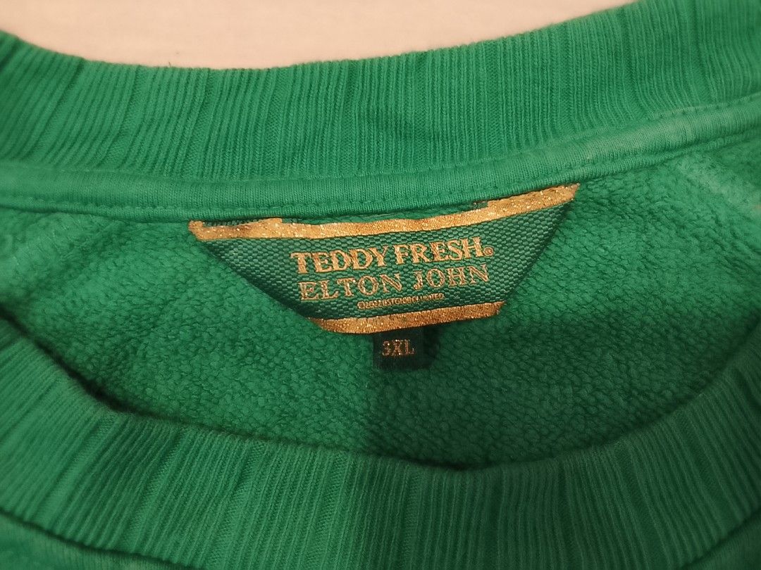 TEDDY FRESH x ELTON JOHN pullover sweatshirt (Category: Coats, Jackets and Outerwear) located in Manila. Submitted by newage.vintage (Listing ID 1466604968, Image 3). Description: - official collaboration with Elton JOHN - embroide front print - 100% cotton - size 3Xl - good condition - dimes 29X27.