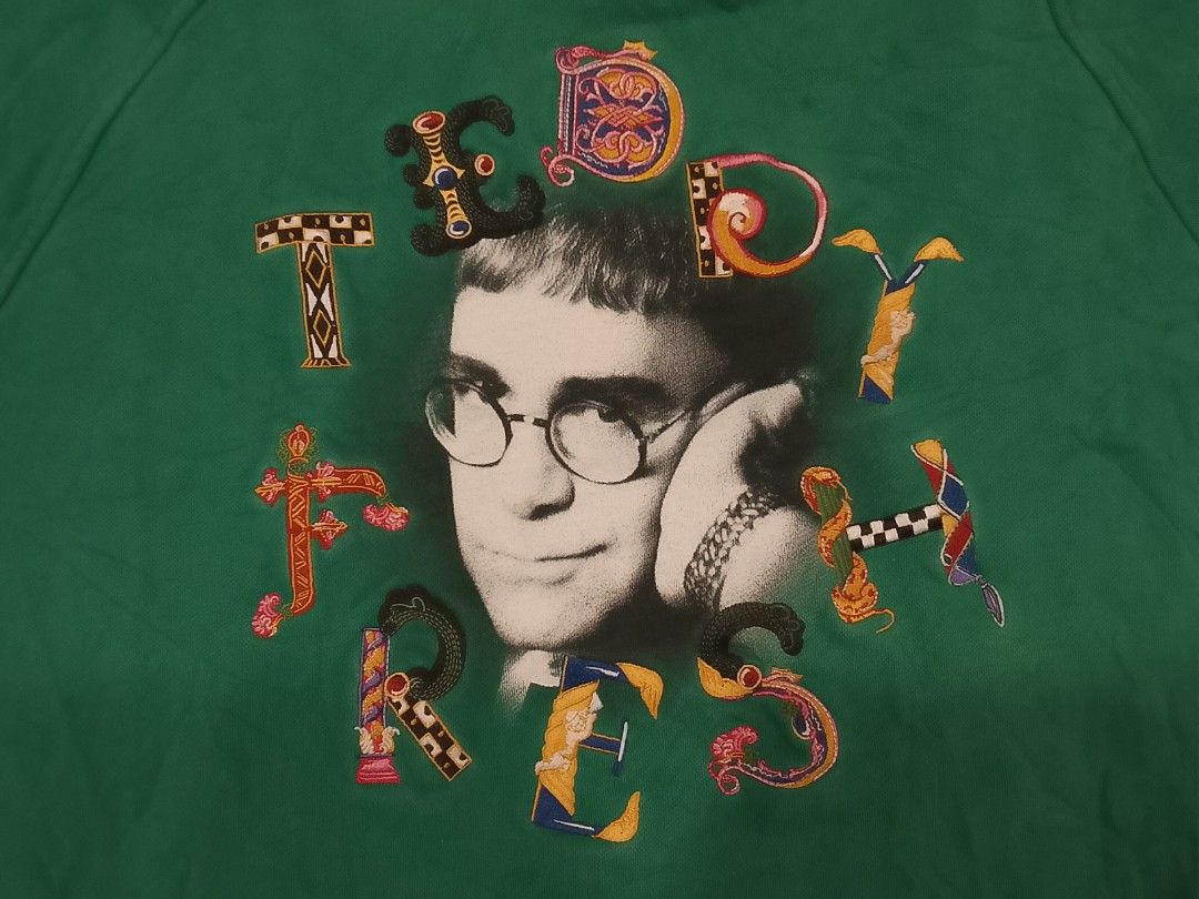 TEDDY FRESH x ELTON JOHN pullover sweatshirt (Category: Coats, Jackets and Outerwear) located in Manila. Submitted by newage.vintage (Listing ID 1466604968, Image 2). Description: - official collaboration with Elton JOHN - embroide front print - 100% cotton - size 3Xl - good condition - dimes 29X27.