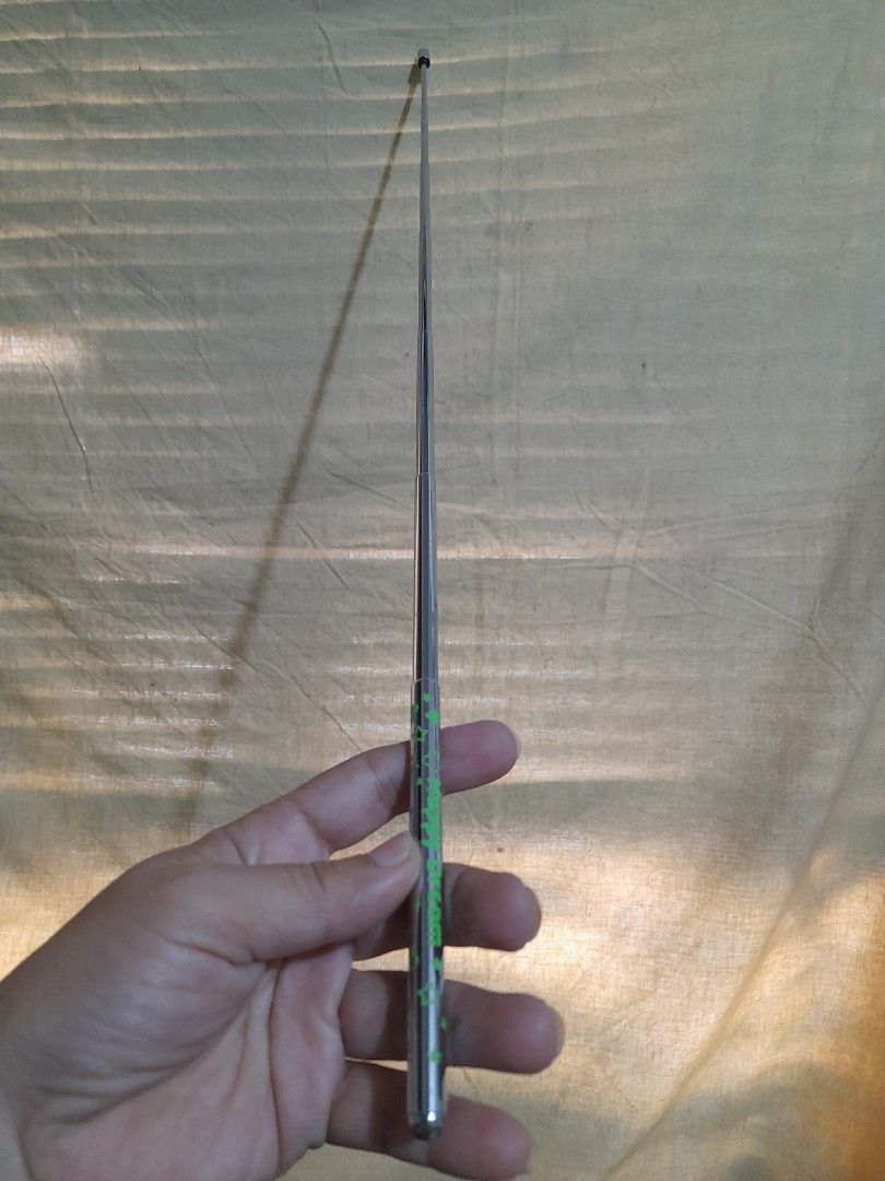 Telescopic Pointer Stick with Green Pattern (Category: Stationery & School Supplies) located in Bocaue. Submitted by marajapansurplus (Listing ID 1466709051, Image 3). Description: - Retractable metal pointer stick, perfect for teaching and presentations - Extends long for use and collapses short for easy pocket storage - Shiny silver finish with a bright green printed clover and star handle grip - Smooth and fully functioning sliding mechanism.