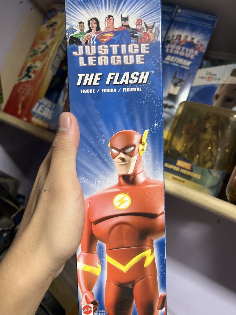 The Flash — Mattel Justice League 10” Action Figure (Category: Figurines & Statues) located in Quezon City. Submitted by thegroovearchive (Listing ID 1466678043, Image 3). Description: - Brand: Mattel - Character: The Flash (Justice League) - Height: 10 inches - Packaging: Original box included - Box Art: Features classic animated series style with Superman, Batman, and Green Lantern on the back - Condition: Brand new/Mint in box (as applicable).