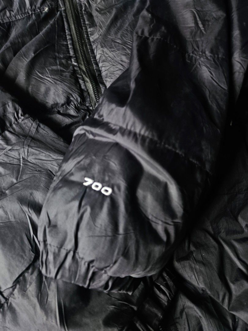 The North Face 700 Down Puffer Jacket Black (Category: Coats, Jackets and Outerwear) located in Manila. Submitted by shanshan.river (Listing ID 1466592829, Image 2). Description: - Brand: The North Face - Color: Classic Black - Insulation: 700 Fill Power (super warm & lightweight) - Details: Iconic white embroidered logo on chest and back shoulder - Features: Full zip front closure & quilted design - Condition: Great cold weather outerwear - Ship