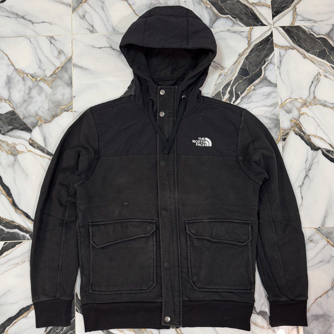 The North Face Black Hooded Jacket Size S (Category: Coats, Jackets and Outerwear) located in Manila. Submitted by fastflip.ph (Listing ID 1466726702, Image 1). Description: - Brand: The North Face - Color: Classic Black - Size: S (Made in Vietnam) - Closure: Full zip with additional snap buttons - Features: Drawstring hood, front pockets, ribbed cuffs and hem - Branding: White embroidered logo on the chest and back shoulder.
