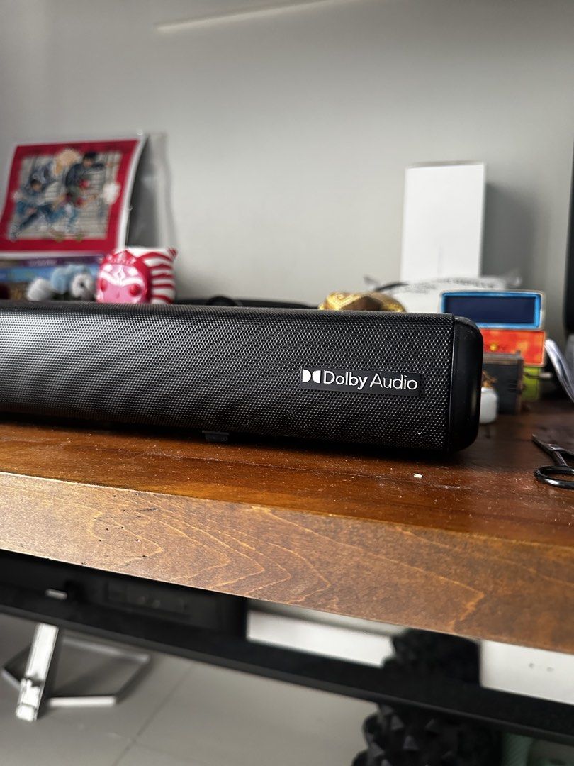 The Platinum Dolby Audio Soundbar (Category: Soundbars, Speakers & Amplifiers) located in Manila. Submitted by skywalker14 (Listing ID 1466589575, Image 2). Description: - Brand/Model: Platinum Soundbar - Audio: Dolby Audio support for immersive sound and clear dialogue - Design: Sleek black mesh grille with convenient top physical controls - Controls: Power, volume adjustment, and input switching - Condition: Clean unit, perfect for upgrading yo