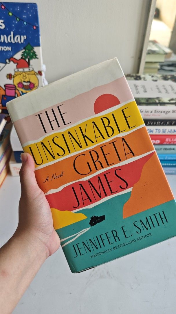 The Unsinkable Greta James by Jennifer E. Smith (Category: Storybooks) located in Cabanatuan. Submitted by paogel21 (Listing ID 1466714994, Image 1). Description: - Title: The Unsinkable Greta James - Author: Jennifer E. Smith - Cover: Colorful art featuring a sun, cruise ship, and ocean waves - Genre: Great contemporary fiction read MOP - Gcash, Bank Transfer.