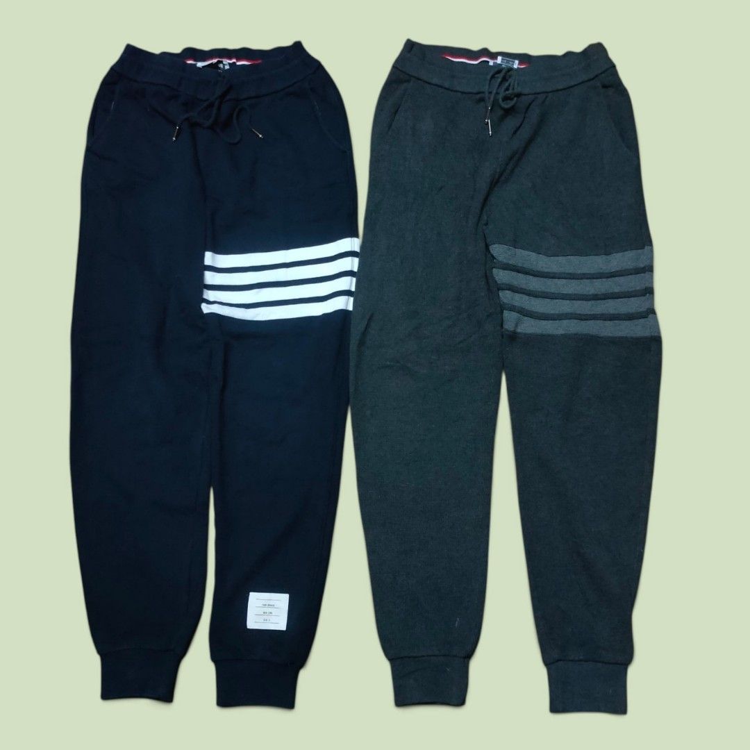 Thom Browne 4-Bar sweatpants ( as pack) (Category: Luxury Apparel) located in Manila. Submitted by montillano25396 (Listing ID 1466669573, Image 1). Description: Thom Browne 4-Bar sweatpants Size: Large (3) Good Condition🫶 as pack!.