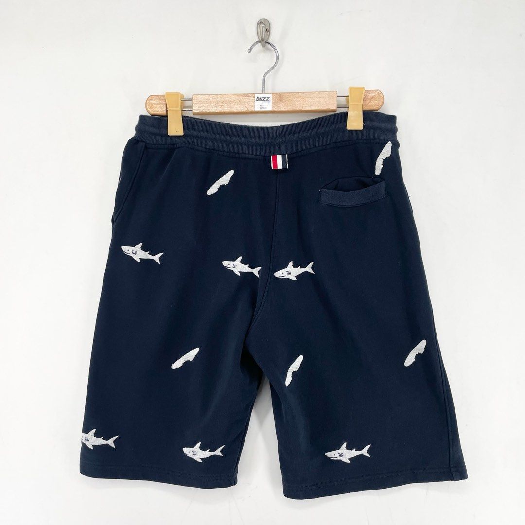 Thom Browne Embroidered Shark Sweat Shorts (Category: Shorts) located in Manila. Submitted by buzz.garments (Listing ID 1466700069, Image 2). Description: Size: 2 on tag Dimensions(inches) -Waist/Width: 30”-40” (Strechable) -Hip: 21” -Front Rise: 13” -Thigh: 11” -Inseam: 10” -Outseam/Length : 21” -Leg Opening: 11” - color may vary due to lighting. please manage your expectations-minimal and unseen flaws must be considered..