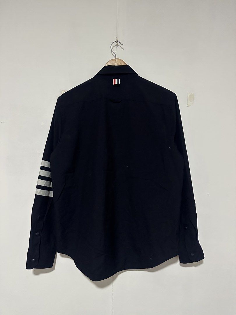 Thom Browne Jacket (Category: Coats, Jackets and Outerwear) located in Las Pinas. Submitted by archimedes.joaquin (Listing ID 1466758084, Image 2). Description: Good as new condition - 9.9/10 color rate - thom browne all snap buttons Sz Large 22.5” width 29” length - no issue.