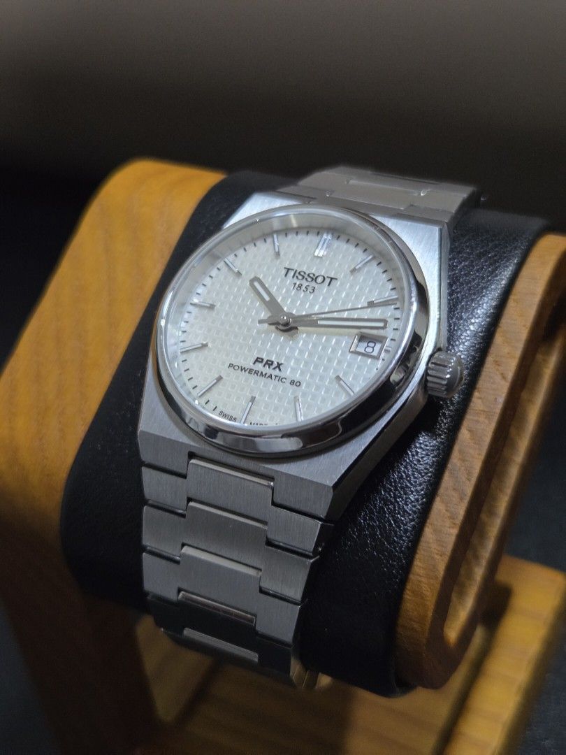 Tissot PRX Powermatic 80 35mm MOP Dial (Category: Luxury Watches) located in Mabalacat. Submitted by watcherwristph (Listing ID 1465377149, Image 2). Description: Tissot PRX Powermatic 80 35mm MOP Dial • Beautiful MOP (Mother of Pearl) dial • Powermatic 80 automatic movement • 35mm case size • Overall in good condition • Lightly used • Hairline scratches on the bracelet from normal wear • No major or deep scratches • Running and functioning prope
