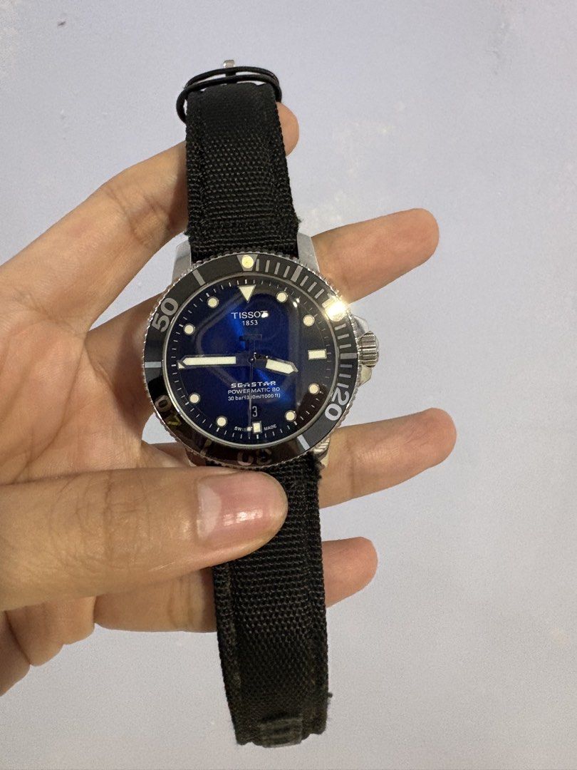 Tissot Seastar 1000 Powermatic 80 (Category: Luxury Watches) located in Navotas City. Submitted by heiresslovecloset (Listing ID 1466626893, Image 3). Description: Tissot Seastar 1000 Powermatic 80 (specifically corresponding to reference T120.407.17.041.01 when equipped with a textile strap, or T120.407.17.041.00 on rubber). Key Specifications: • Movement: Swiss Automatic Powermatic 80 caliber, offering up to an 80-hour power reserve. • Case Siz