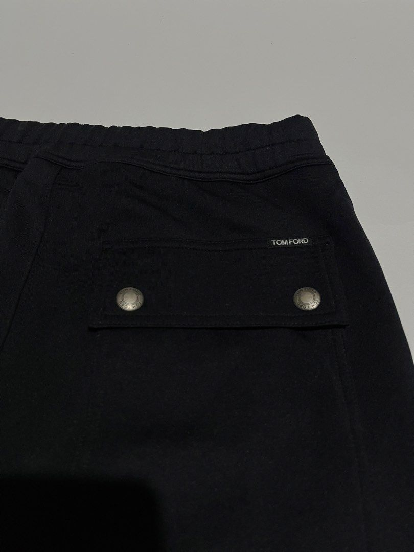 Tom Ford Black Sweatpants Joggers with Zips (Category: Joggers) located in Dumangas. Submitted by chiiieeef (Listing ID 1466563728, Image 2). Description: - Brand: Tom Ford - Color: Black - Style: Luxury streetwear sweatpants with front creases - Material: Premium Made-in-Italy blend of polyester, cotton, and polyurethane - Hardware: Metal-tipped drawstrings and engraved snap buttons on back pocket - Details: Signature white brand label, luxuriou