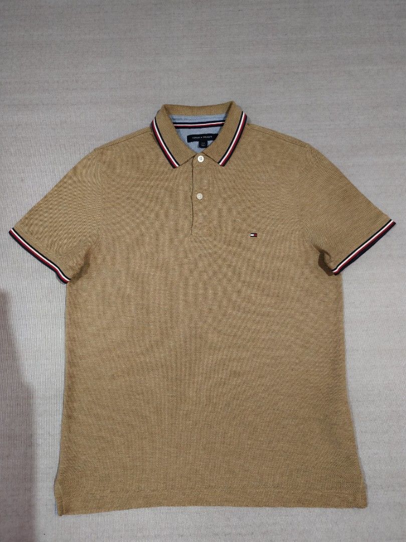 TOMMY HILFIGER KHAKI (Category: Tshirts & Polo Shirts ) located in Baliuag. Submitted by vk_thrift01 (Listing ID 1466736535, Image 2). Description: TOMMY HILFIGER KHAKI DIMES: 19.5 X 26.5 CONDI: EXCELLENT CONDITION COLOR RATE: 9.8/10 ISSUE: MINIMAL FOLD LINES PRICE: 1,250 NOTE: ‼️‼️‼️ 📌ALL ITEMS ARE THRIFTED NOT BRANDNEW SO KINDLY MANAGE YOUR EXPECTATIONS. 📌ALL ITEMS ARE NEEDS WASH 📌COLOR MAY SLIGHTLY DIFFER DUE TO LIGHTING CONDITION 📌NO CANC