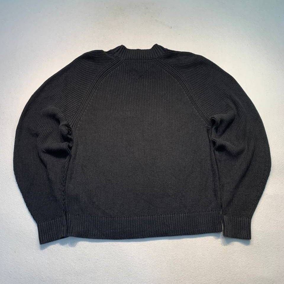 Tommy Jeans Dark Grey Knit Sweater (Category: Coats, Jackets and Outerwear) located in Mandaluyong City. Submitted by theroom501 (Listing ID 1466693563, Image 2). Description: Tommy Jeans Dark Grey Knit Sweater Style Code: Size on Tag: Small Color: Black Condition: Good pre-owned condition with a heavily distressed vintage look. Flaws/Issues: None Flat Lay Measurements: Pit to Pit: 22 inches Length: 24 inches Arm opening Length: inches Price: 180
