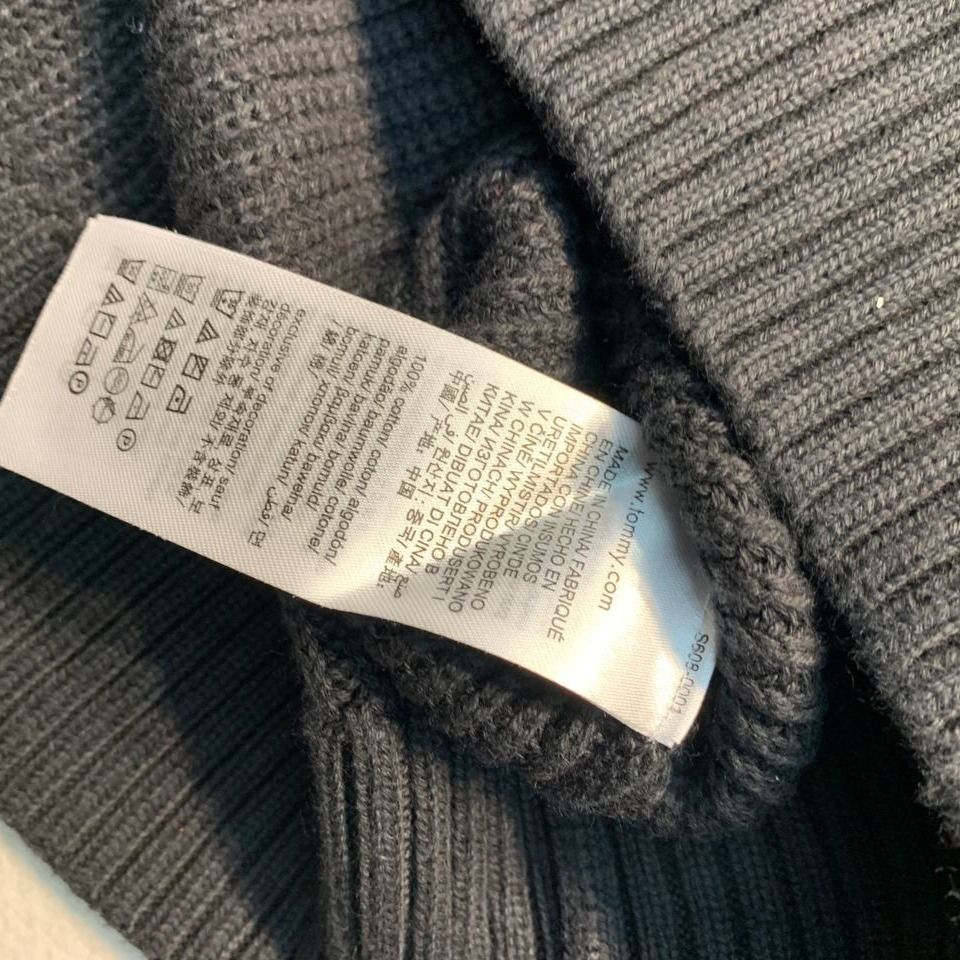 Tommy Jeans Dark Grey Knit Sweater (Category: Coats, Jackets and Outerwear) located in Mandaluyong City. Submitted by theroom501 (Listing ID 1466693563, Image 3). Description: Tommy Jeans Dark Grey Knit Sweater Style Code: Size on Tag: Small Color: Black Condition: Good pre-owned condition with a heavily distressed vintage look. Flaws/Issues: None Flat Lay Measurements: Pit to Pit: 22 inches Length: 24 inches Arm opening Length: inches Price: 180