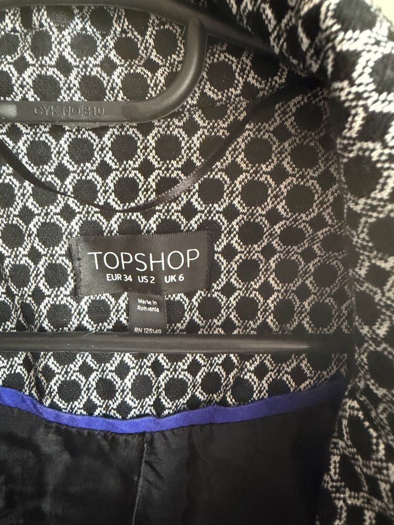 Topshop Black and White Patterned Blazer UK 6 (Category: Coats, Jackets and Outerwear) located in Quezon City. Submitted by bubspreloved (Listing ID 1466645331, Image 2). Description: - Brand: Topshop - Size: UK 6 / EUR 34 / US 2 - Pattern: Black and white geometric - Details: Fully lined with contrast blue trim, classic lapel collar, and structured shoulders - Condition: Great pre-loved condition - Style: Perfect for office wear, smart casual ou