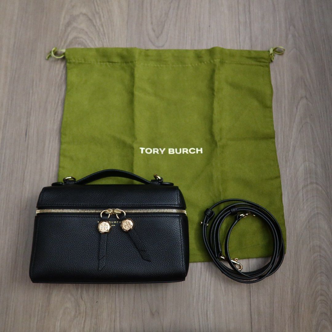 Tory Burch Black Vanity Crossbody Bag (Category: Luxury Bags & Wallets) located in Manila. Submitted by gentlewind_62f064 (Listing ID 1466594099, Image 1). Description: - Brand: Tory Burch Vanity Bag - Material: Luxurious black pebbled leather - Hardware & Closure: Zip-around closure with signature double logo zipper pulls - Versatility: Includes a top handle and a detachable, adjustable black leather strap - Inclusions: Green dust bag and origin