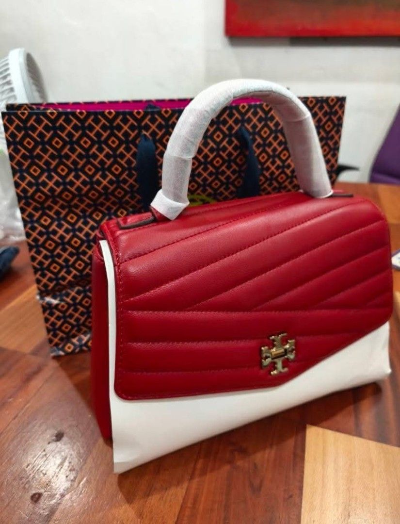 Tory Burch red satchel bag (Category: Luxury Bags & Wallets) located in Quezon City. Submitted by yancartz (Listing ID 1466744547, Image 1). Description: rfs: decluttering unopened items price nego.