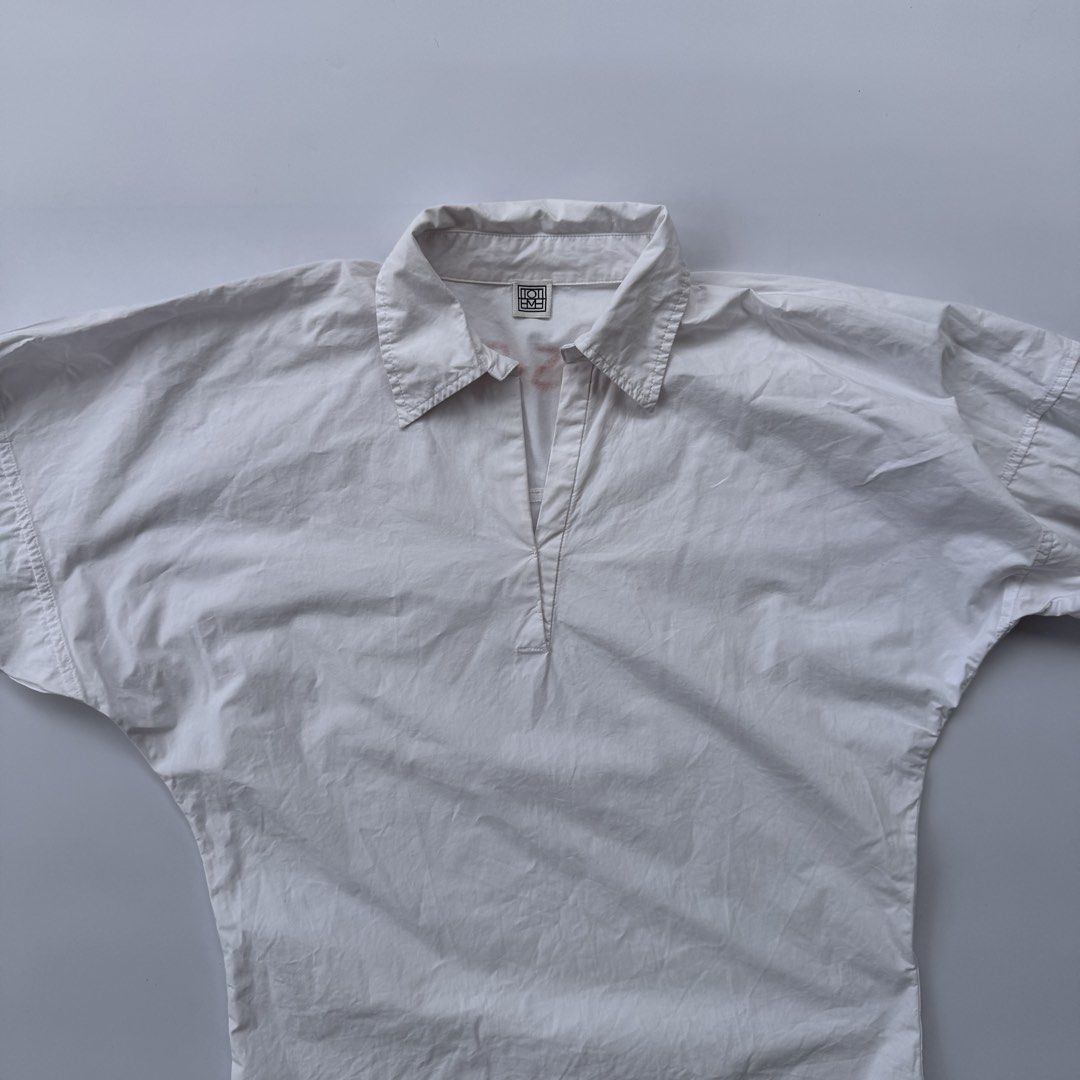 Toteme Vneck Blouse (Category: Luxury Apparel) located in Iloilo. Submitted by 50houndidz (Listing ID 1466587646, Image 3). Description: Toteme Vneck Blouse excellent no issue size: 34 measurements: 22 pit to pit 25 length 17 sleeve length 28.5 shoulder dm for more questions.