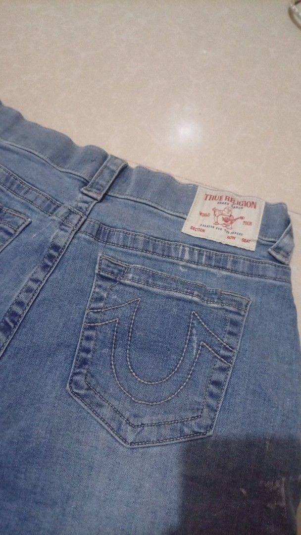True Religion Denim Shorts (Category: Shorts) located in Manila. Submitted by lilsintenel (Listing ID 1466577318, Image 3). Description: - Brand: True Religion - Wash: Classic blue - Fit: Regular fit, mid-length - Closure: Button fly - Features: Front pockets, iconic back pocket flap stitching, and branded back patch - Condition: Great for casual everyday wear and warm weather.