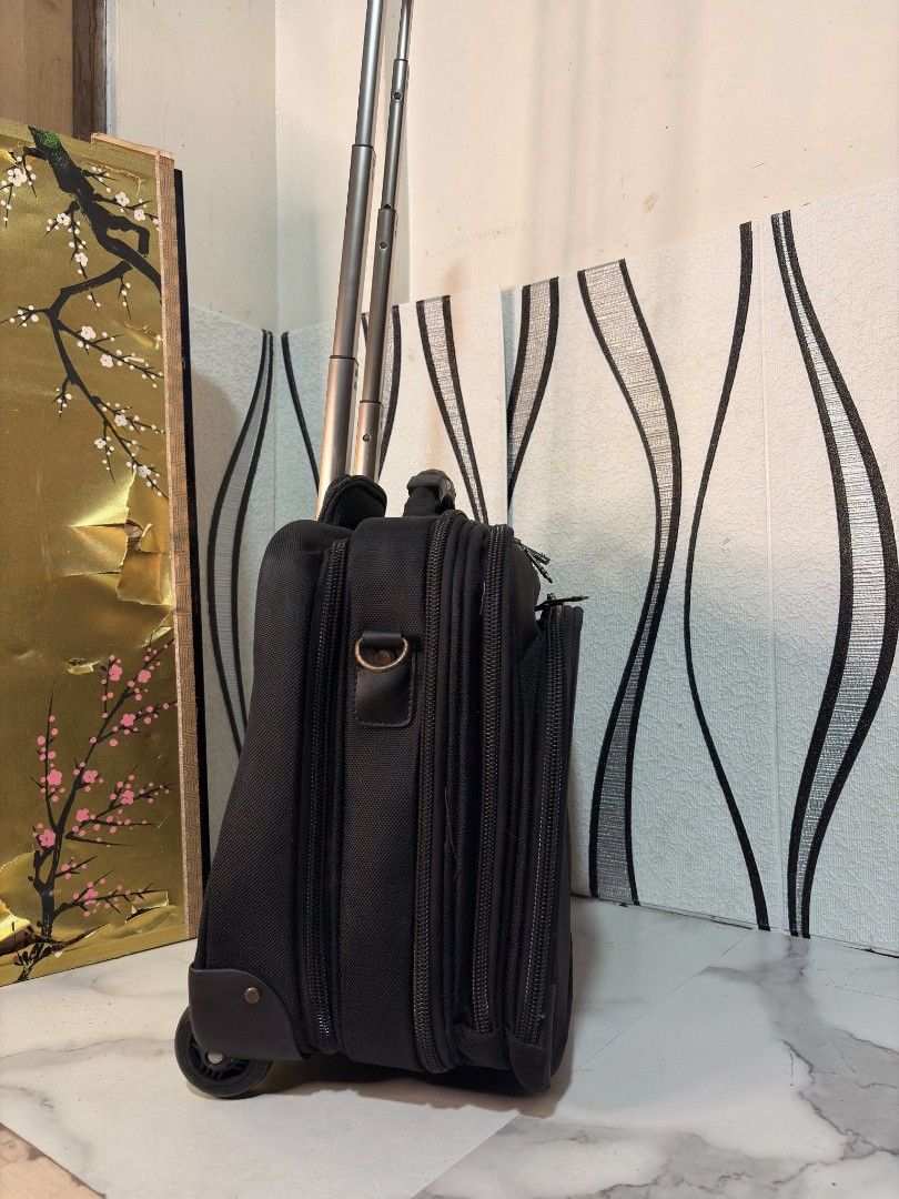 Tumi Business Type luggage (Category: Luggage) located in Manila. Submitted by jzjapansurplus (Listing ID 1466599094, Image 3). Description: 🇯🇵IMPORTED FROM JAPAN ORIGINAL TUMI BRAND BUSINESS TYPE LUGGAGE🇯🇵 🎯 WITH LAPTOP COMPARTMENT 🎯 SMOOTH WHEELS ROTATION 🎯 FRONT POCKET COMPARTMENT 🎯 HIGH QUALITY POLYESTER MATERIAL 🎯 SMOOTH PUSH HANDLE TROLLEY 🎯 TOP HANDLE CARRIER 🎯 WIDE SPACE CAPACITY NO ISSUE.. MINIMAL SIGN OF USAGE‼️.