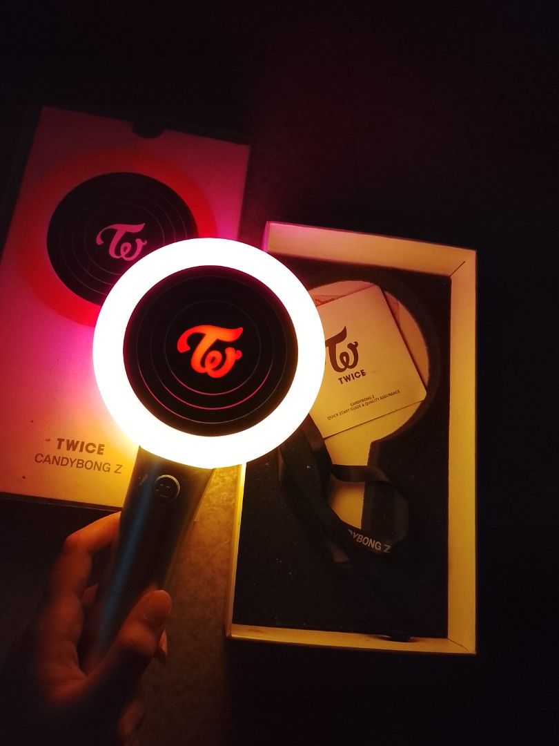 TWICE Candybong Z Official Lightstick with Box (Category: K-Wave Merchandise) located in Pasay City. Submitted by kotonefilms (Listing ID 1466620257, Image 1). Description: batteries are not free. the battery holder is new, i just bought it yesterday. can send many photos/videos and can transact on x. - 100% Official TWICE Candybong Z lightstick - Tested and working brightly - Includes original box, strap, and manual - Minor handling marks on the