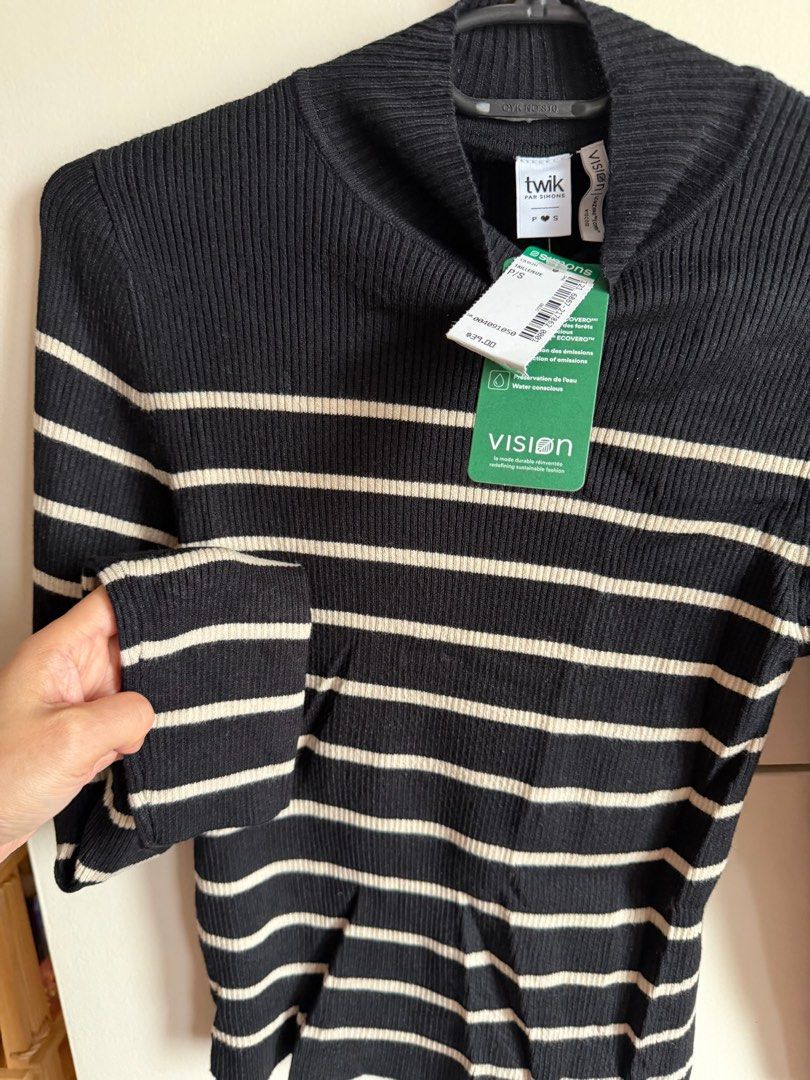 Twik Par Simons Black Striped Mock Neck Sweater (Category: Longsleeves) located in Quezon City. Submitted by bubspreloved (Listing ID 1466643418, Image 1). Description: - Brand: Twik par Simons - Condition: Brand new with original store tags attached - Size: Small - Style: Black and white striped ribbed knit sweater with mock neckline and long sleeves - Retail Price: $39 - Perfect for layering and effortless everyday styling! Brand new with tag. 