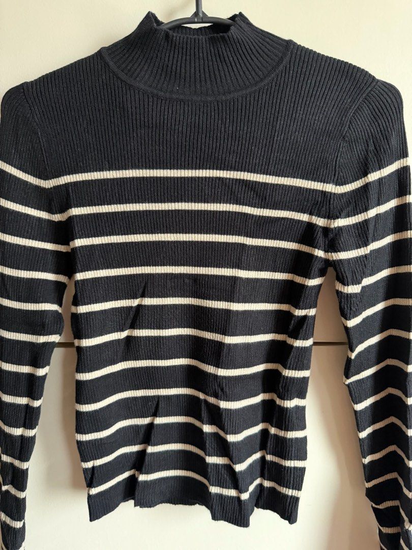 Twik Par Simons Black Striped Mock Neck Sweater (Category: Longsleeves) located in Quezon City. Submitted by bubspreloved (Listing ID 1466643418, Image 3). Description: - Brand: Twik par Simons - Condition: Brand new with original store tags attached - Size: Small - Style: Black and white striped ribbed knit sweater with mock neckline and long sleeves - Retail Price: $39 - Perfect for layering and effortless everyday styling! Brand new with tag. 
