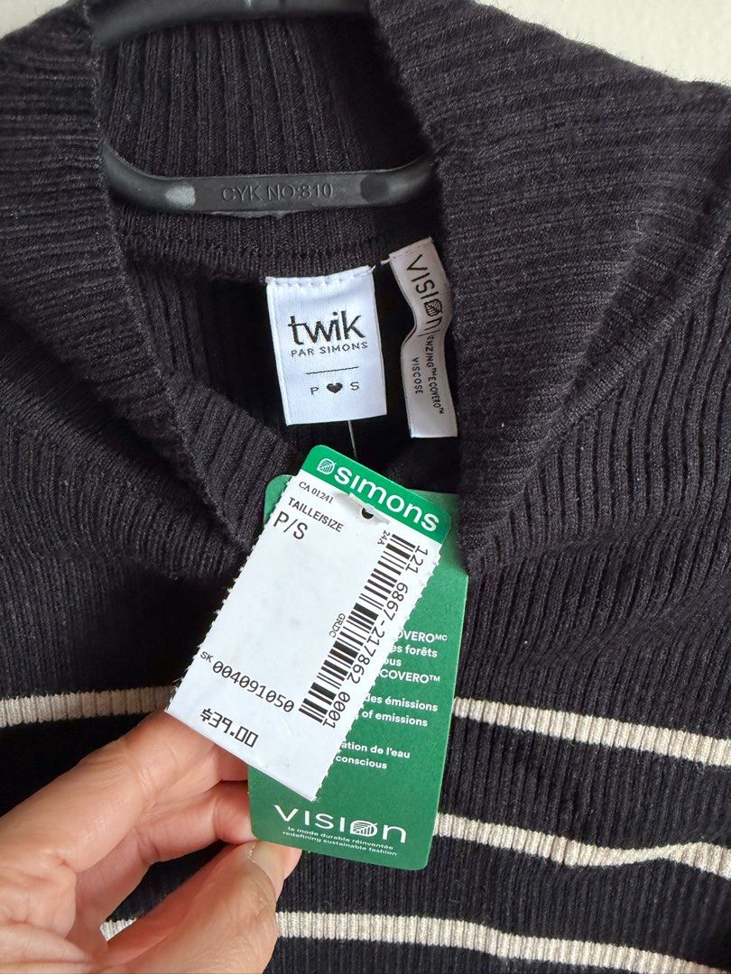 Twik Par Simons Black Striped Mock Neck Sweater (Category: Longsleeves) located in Quezon City. Submitted by bubspreloved (Listing ID 1466643418, Image 2). Description: - Brand: Twik par Simons - Condition: Brand new with original store tags attached - Size: Small - Style: Black and white striped ribbed knit sweater with mock neckline and long sleeves - Retail Price: $39 - Perfect for layering and effortless everyday styling! Brand new with tag. 
