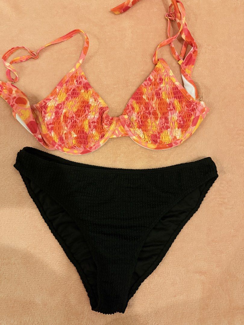 Two-Piece Bikini Set Orange Red Floral Black Bottom (Category: Bikinis & Swimsuits) located in Pasig City. Submitted by shop.gelss (Listing ID 1466770041, Image 1). Description: Top - fit 36 to 38 bust Bottom - fit 30 waist.