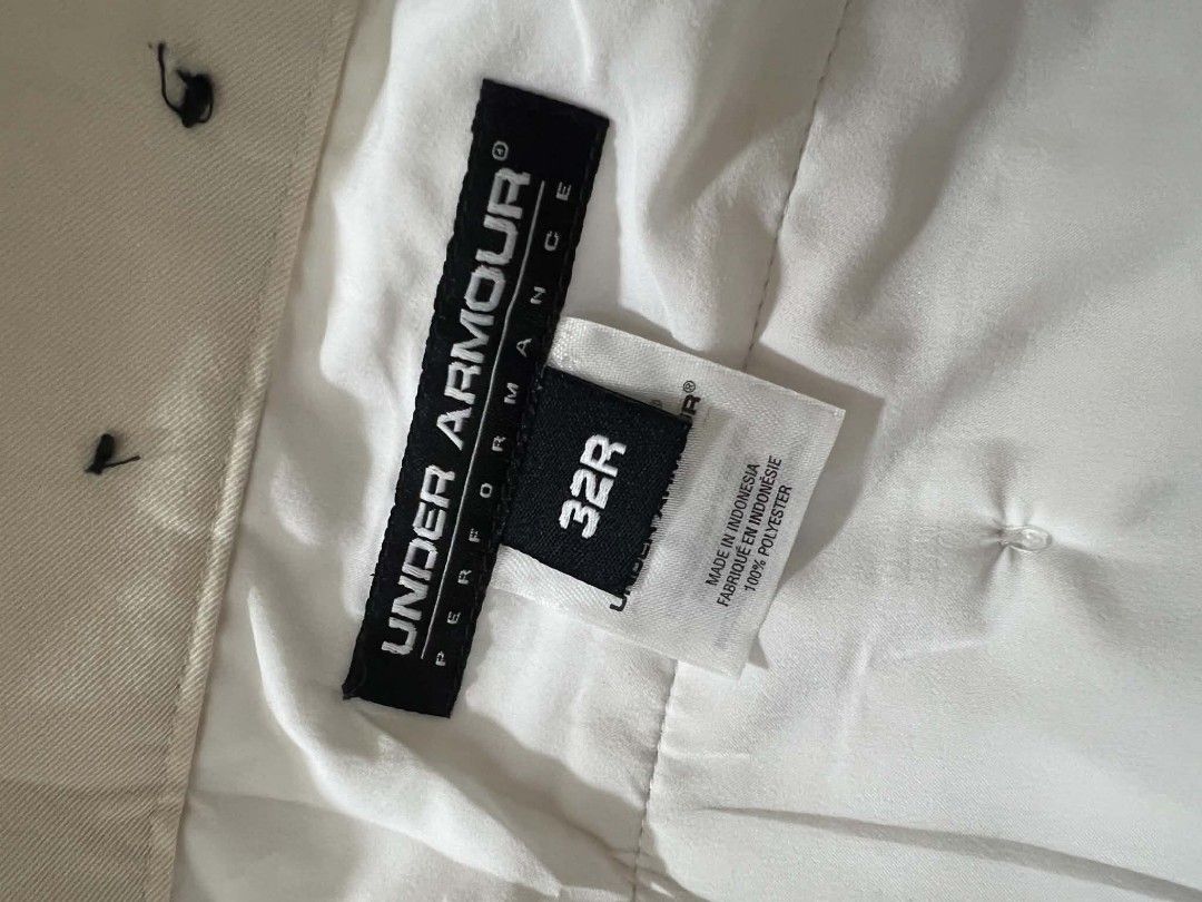 Under Armour Performance Shorts Size 32R Off-White (Category: Shorts) located in Quezon City. Submitted by jutang21 (Listing ID 1466705286, Image 2). Description: - Brand: Under Armour - Style: Performance Shorts - Color: Off-white -Like New - Size: 32w 20.5L - Material: 100% Polyester - Closure: Button with Ideal zipper fly - Details: Embroidered Under Armour logo on belt loop - Origin: Made in Indonesia - Fit: Casual, clean look for daily wear.