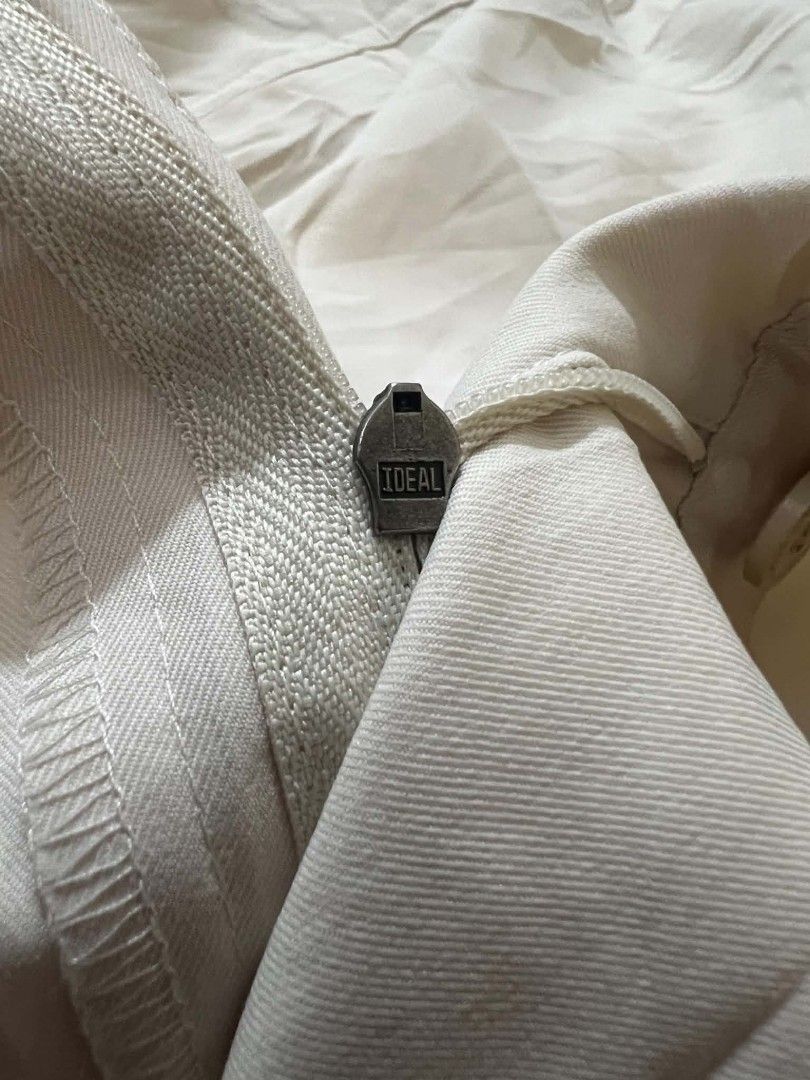 Under Armour Performance Shorts Size 32R Off-White (Category: Shorts) located in Quezon City. Submitted by jutang21 (Listing ID 1466705286, Image 3). Description: - Brand: Under Armour - Style: Performance Shorts - Color: Off-white -Like New - Size: 32w 20.5L - Material: 100% Polyester - Closure: Button with Ideal zipper fly - Details: Embroidered Under Armour logo on belt loop - Origin: Made in Indonesia - Fit: Casual, clean look for daily wear.