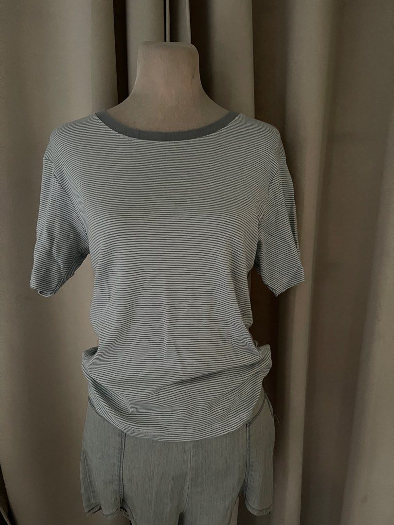 uni stripes cotton knit (Category: Shirts) located in Cainta. Submitted by zlove111 (Listing ID 1466662224, Image 1). Description: - Brand: u - Size: large -xl - Design: Classic stripes with grey contrast collar trim - Sleeves: Short sleeves - Fabric: Lightweight and comfortable - Condition: Excellent basic piece for daily casual wear, easy to match with jeans or shorts up ti 40 bust 34 waist.