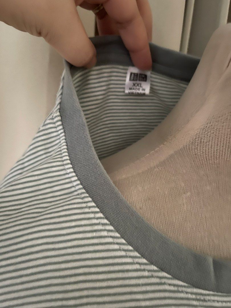 uni stripes cotton knit (Category: Shirts) located in Cainta. Submitted by zlove111 (Listing ID 1466662224, Image 3). Description: - Brand: u - Size: large -xl - Design: Classic stripes with grey contrast collar trim - Sleeves: Short sleeves - Fabric: Lightweight and comfortable - Condition: Excellent basic piece for daily casual wear, easy to match with jeans or shorts up ti 40 bust 34 waist.