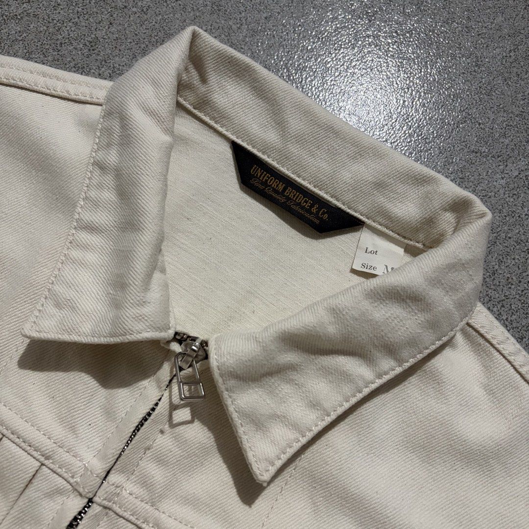 Uniform Bridge Type 2 Trucker Jacket (Category: Coats, Jackets and Outerwear) located in Talisay. Submitted by re_sell01 (Listing ID 1466707876, Image 3). Description: Uniform Bridge Type 2 Trucker Jacket Medium Mens W22 L24 Color Cream White Excellent Condition.