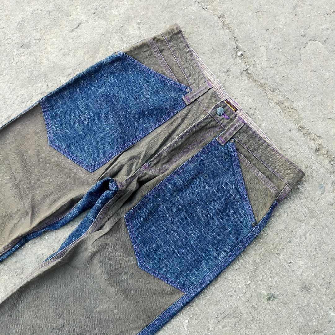 UNION MADE (SACRIFICE) WORKMAN SHIP BAKER PANTS (Category: Activewear) located in Zamboanga. Submitted by _oliverbmth (Listing ID 1466623260, Image 3). Description: - Style: Unique two-tone color block streetwear pants - Material Mix: Textured blue denim and brown fabric panels - Fit: Adjustable back cinch buckle at the waist - Details: Contrast purple stitching and distinct pocket flaps - Closure: Button fly - Condition: Great unique piece to el