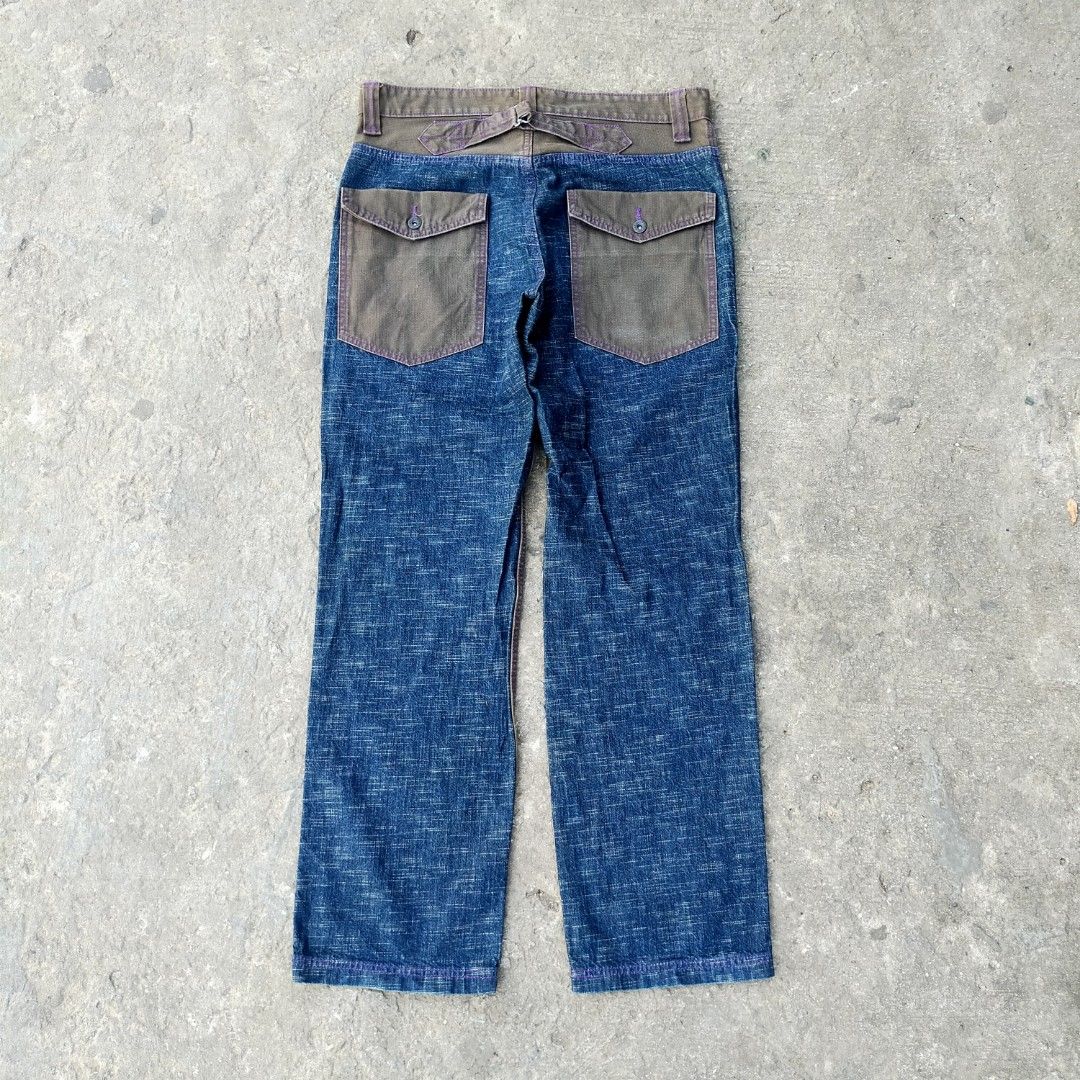 UNION MADE (SACRIFICE) WORKMAN SHIP BAKER PANTS (Category: Activewear) located in Zamboanga. Submitted by _oliverbmth (Listing ID 1466623260, Image 2). Description: - Style: Unique two-tone color block streetwear pants - Material Mix: Textured blue denim and brown fabric panels - Fit: Adjustable back cinch buckle at the waist - Details: Contrast purple stitching and distinct pocket flaps - Closure: Button fly - Condition: Great unique piece to el