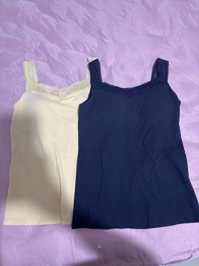 Uniqlo Camisole Tank Top Bundle (Category: Sleeveless) located in Manila. Submitted by declutterwithbeyuh (Listing ID 1466638131, Image 1). Description: - Brand: Uniqlo Airism and Heattech - Item: Bundle of 3 ribbed camisole tank tops - Colors: Dark grey, navy blue, and cream - Size: M (fits bust 80-86cm) - Condition: Good, worn a few times - Features: Stretchy fabric, super comfortable, keeps you warm, and perfect for layering TAKE ALL FOR 1k if