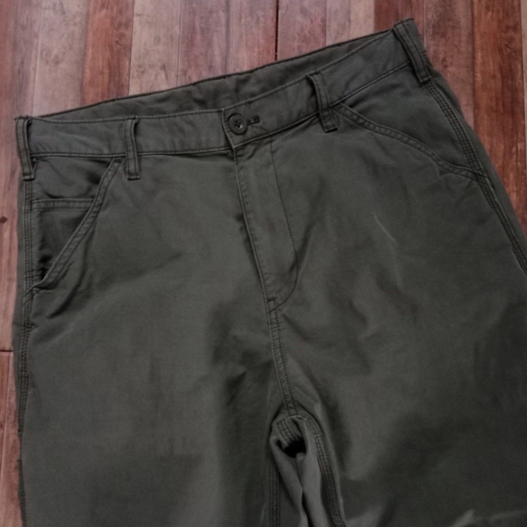 UNIQLO Olive Green Carpenter Pants Size M (Category: Jeans) located in Silang. Submitted by densrodrig08604 (Listing ID 1466757913, Image 3). Description: - Brand/Item: Uniqlo olive green carpenter pants - Size: M - Features: Utility side pockets, back patch pockets, and contrast stitching - Waist: Inside drawstring for an adjustable fit - Material: Sturdy cotton fabric -verygood condition -no ussue / needwash -payment 1st,gcash -shipp via flash 