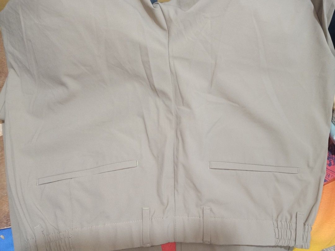 Uniqlo trousers (Category: Trousers) located in Pasig City. Submitted by urdal01 (Listing ID 1466598119, Image 3). Description: Brand: UNIQLO (in collaboration with Theory) Product Code / Style Number: 321-444609 Size: Men's Medium (M) — fits a waist size of roughly 76–84 cm Material: 100% Polyester (Ultra Light / AirSense fabric) Origin: Made in China length'40 waistline'34.