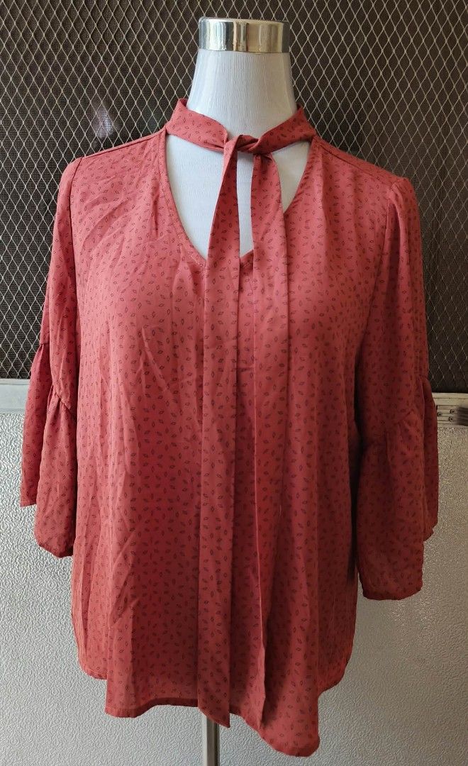 Urban Romantics Rust Orange Diamond Print Blouse (Category: Blouses) located in Cebu City. Submitted by violacloset (Listing ID 1466649312, Image 1). Description: Measurements: length: 23 1/2 width: 21.