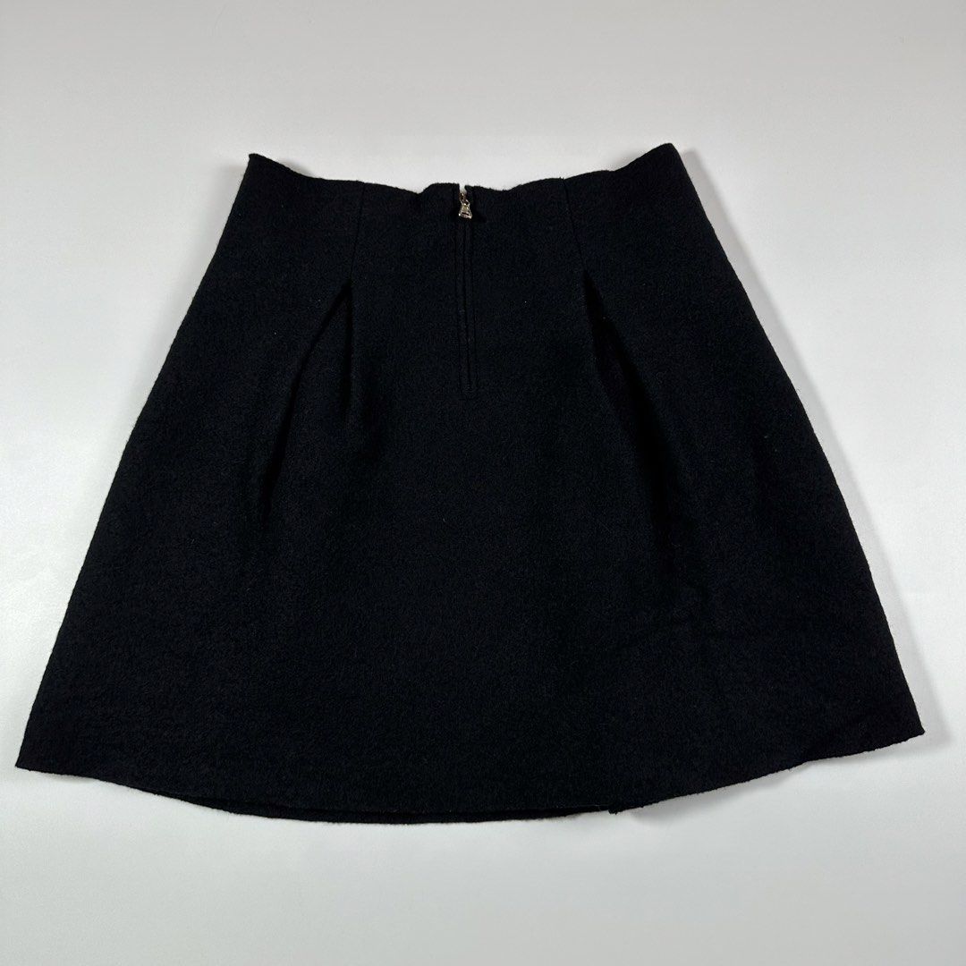 Valentino black wool A-line skirt. (Category: Luxury Apparel) located in Villasis. Submitted by draefindss_ph (Listing ID 1466721214, Image 2). Description: Valentino black wool A-line skirt. 𝚂𝚒𝚣𝚎: S 𝙼𝚎𝚊𝚜𝚞𝚛𝚎𝚖𝚎𝚗𝚝 (𝚒𝚗𝚌𝚑𝚎𝚜) 𝚠𝚊𝚒𝚜𝚝: 31 𝚕𝚎𝚗𝚐𝚝𝚑: 19.5 Excellent Condition No issue 2,500 + sf only.