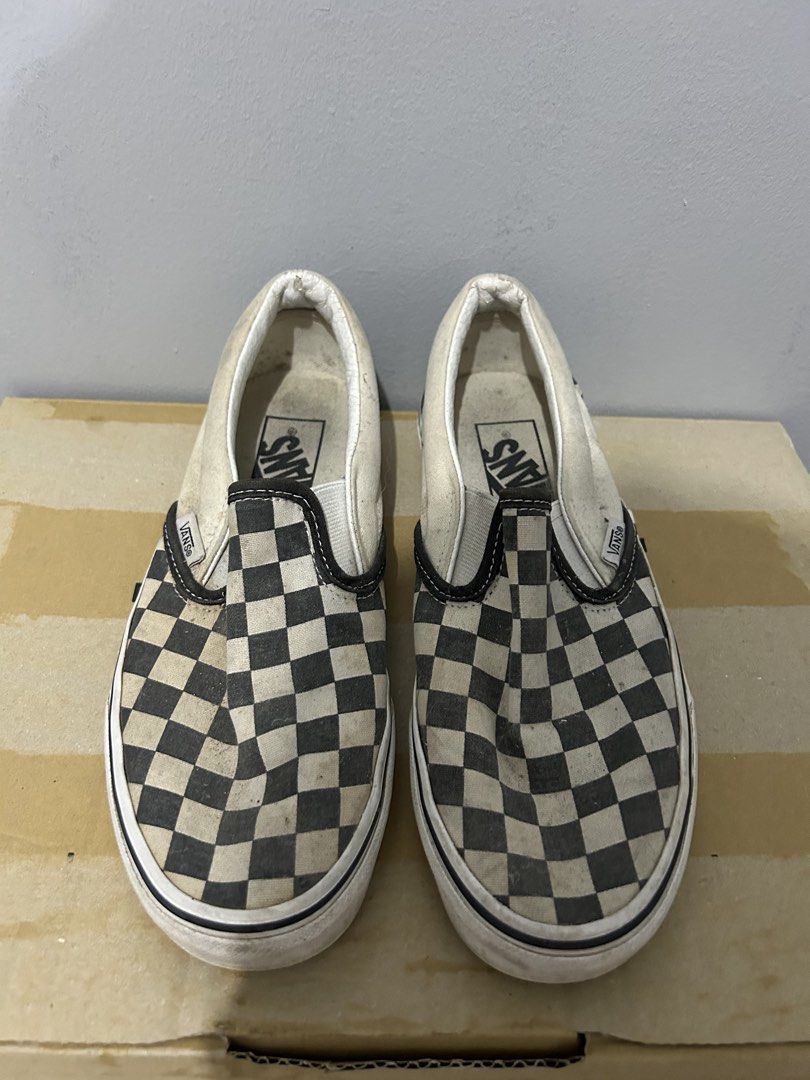 Vans Classic Checkerboard Slip-On Shoes (Category: Sneakers) located in Manila. Submitted by dtbalanza109684 (Listing ID 1466692899, Image 3). Description: - Brand: Vans - Style: Checkerboard Slip-On (Black/White) - Size: 24.5cm / US 7 Women's - Condition: Pre-owned with signs of wear (mild yellowing on fabric and dirt on rubber soles) - Durability: Uppers still solid, lots of life left for everyday casual use - Perfect for effortless, everyday s