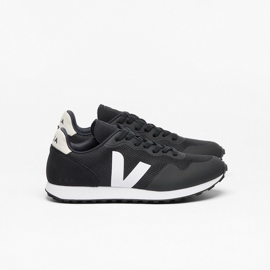 VEJA SDU-B Mesh Black White Sneakers (Category: Sneakers) located in Quezon City. Submitted by corrnic (Listing ID 1466575535, Image 1). Description: - Brand: Veja - Colorway: Black and White - Details: Chunky contrast V logo, mesh upper, suede heel panels, and rubber toe cap - Soles: White midsole and treaded outsole - Condition: Comfort-focused everyday wear with minor scuffs on the midsoles from regular use - Closure: Classic lace-up front.