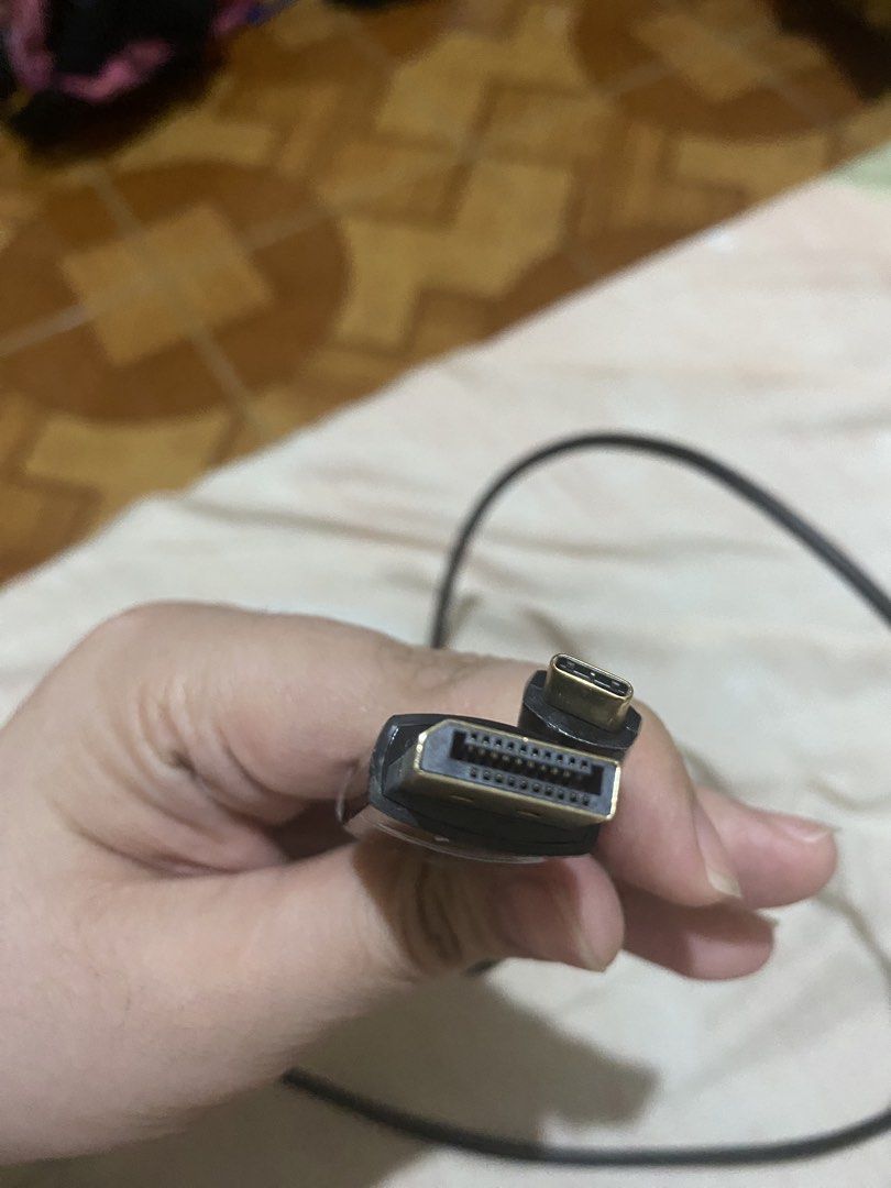 Vention DisplayPort to USB-C Bi-directional Cable (Category: Cables & Adaptors) located in Manila. Submitted by deesdeclutter (Listing ID 1466695742, Image 1). Description: - Brand: Vention - Type: USB-C to DisplayPort Cable - Color: Black with premium gold-plated connectors - Condition: Barely used, works perfectly (protective plastic film still on connector housing) - Compatibility: Connects laptops and phones directly to monitors.