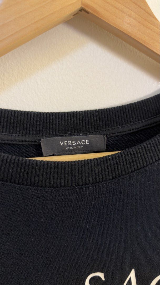 Versace Medusa Logo Sweatshirt Black (Category: Coats, Jackets and Outerwear) located in Paranaque City. Submitted by preluxeshop_ph (Listing ID 1466765738, Image 3). Description: Versace Medusa Logo Sweatshirt Black -Iconic Medusa logo and ‘via Gesù 12 MILANO’ print -Condition: 9.8/10 -Dimes: Length: 27” Width: 22”.