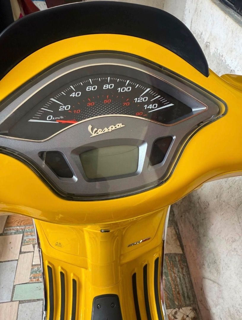 Vespa 150 ABS Yellow Scooter (Category: Motorbikes for Sale) located in Taguig. Submitted by oddfire_e5b557 (Listing ID 1466633452, Image 3). Description: Bright yellow Vespa 150 ABS scooter. Classic design with chrome trim and modern LED headlight. Analog and digital instrument cluster with clear speed gauge up to 140 km/h. Floor board features black rubber strips for grip. Clean bodywork, vibrant paint finish, ready to ride..