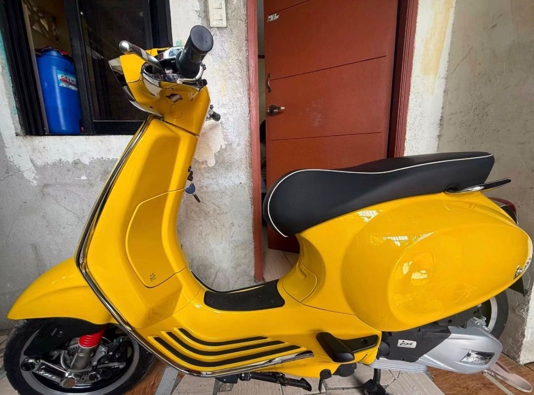 Vespa 150 ABS Yellow Scooter (Category: Motorbikes for Sale) located in Taguig. Submitted by oddfire_e5b557 (Listing ID 1466633452, Image 2). Description: Bright yellow Vespa 150 ABS scooter. Classic design with chrome trim and modern LED headlight. Analog and digital instrument cluster with clear speed gauge up to 140 km/h. Floor board features black rubber strips for grip. Clean bodywork, vibrant paint finish, ready to ride..